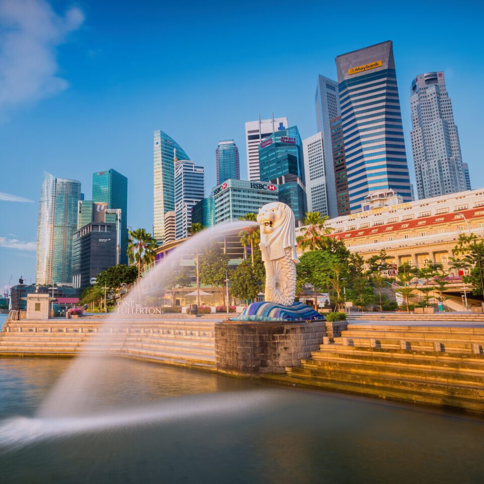 Singapore, Singapore - September 1, 2014: The Merlion fountain in front of the Marina Bay Sands hotel on September 01, 2014 in Singapore. Merlion is a imaginary creature with the head of a lion, seen as a symbol of Singapore